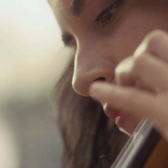 woman playing a musical instrument